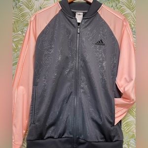 Adidas full zipper, track jacket with a subtle, embossed floral design on body.